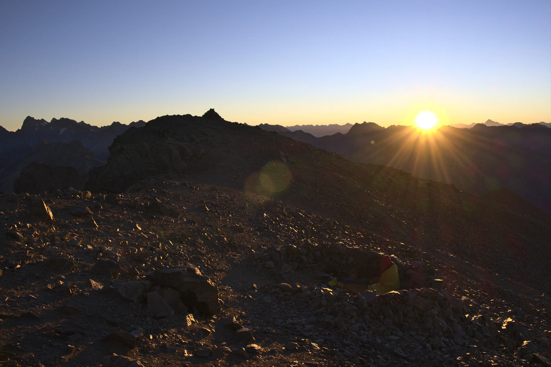 Bivouac tent on the Vieux Chaillol ridge at sunrise