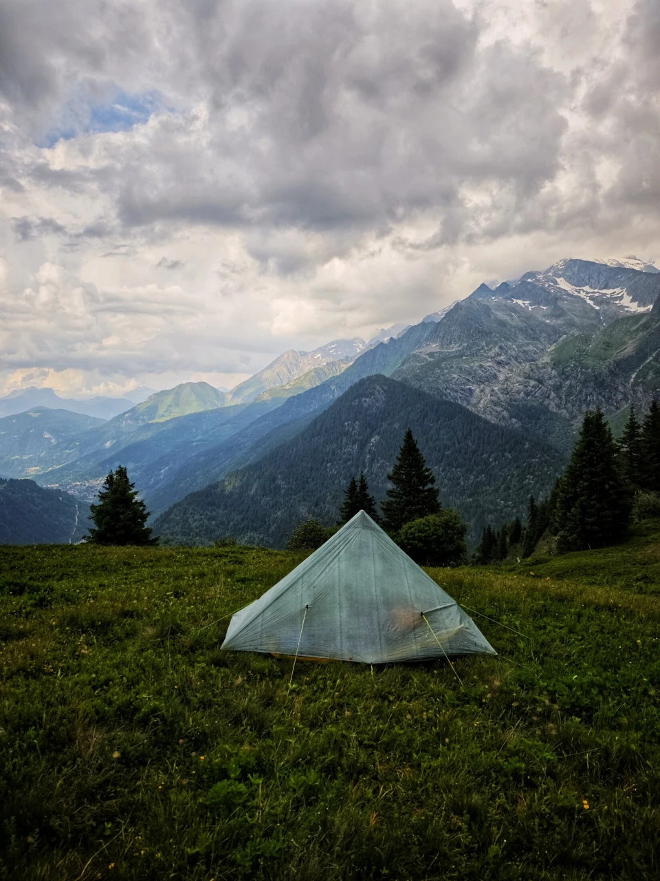 The weather has its say too: on the TMB, an evening under canvas looks more often like this than a golden postcard