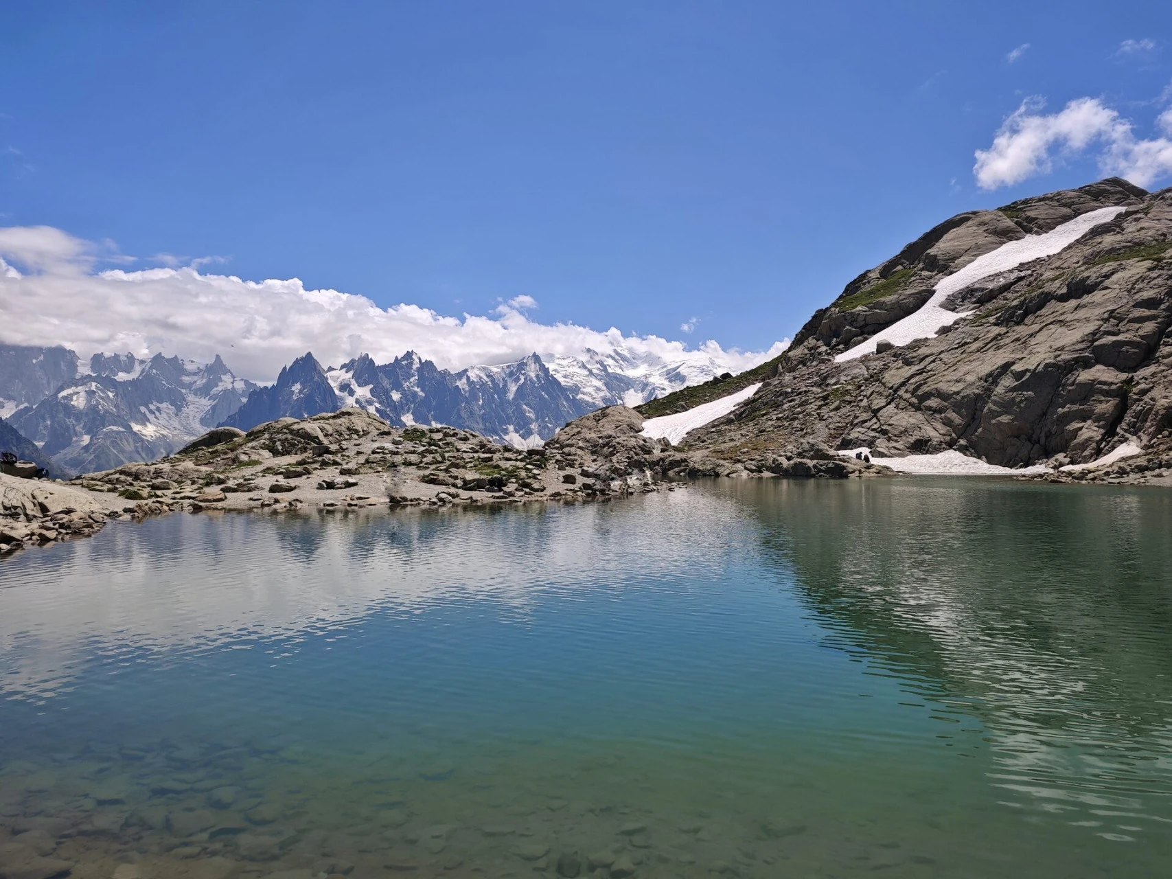 Lac Blanc (2,352 m) facing the Aiguilles de Chamonix and the Mont-Blanc massif