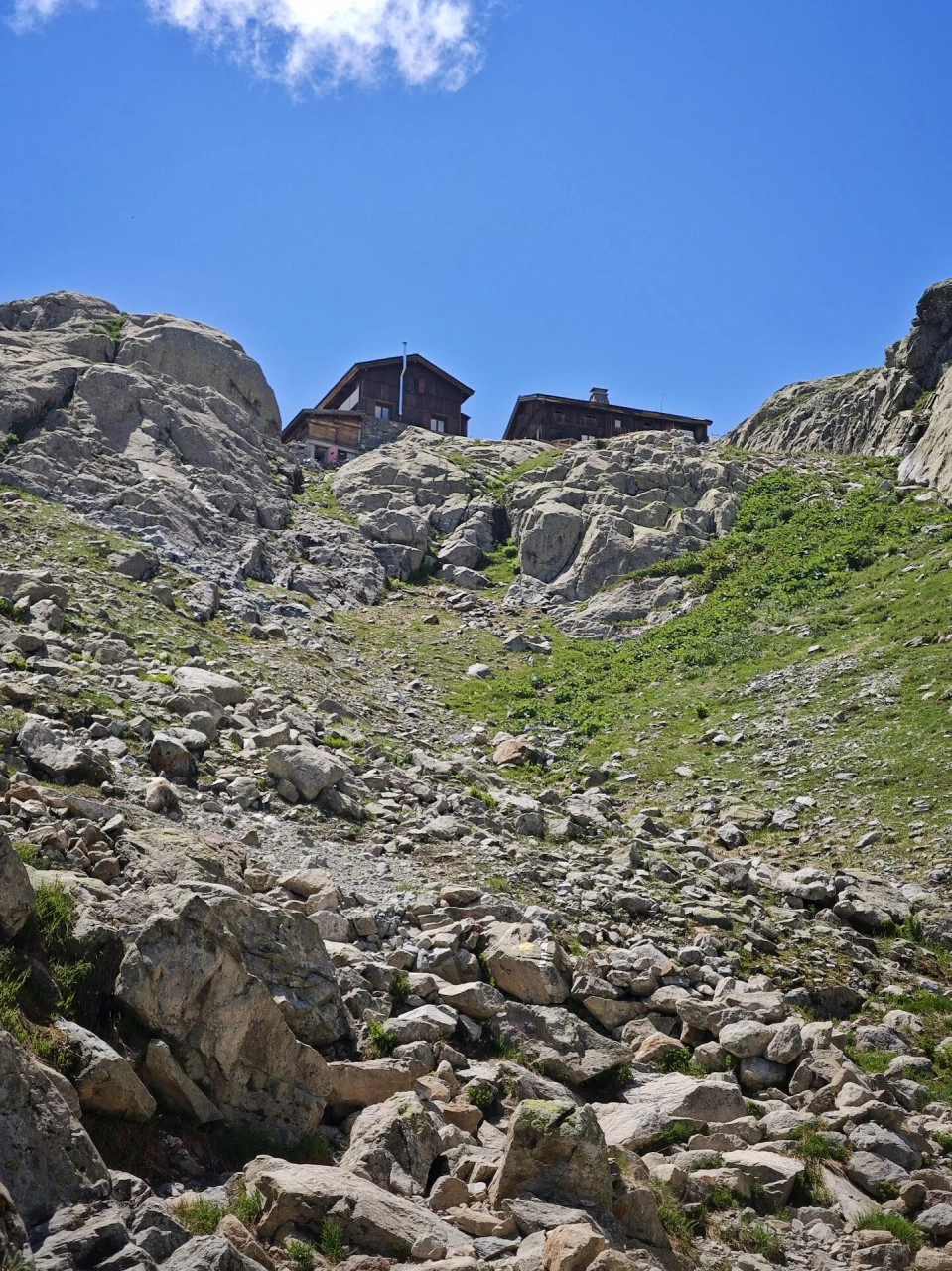 The Refuge du Lac Blanc, sitting on the slabs above the ascent path